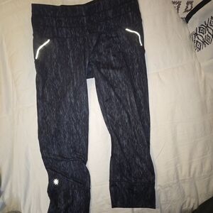 Athleta Dark Heather Navy Capri Leggings with Reflective Details